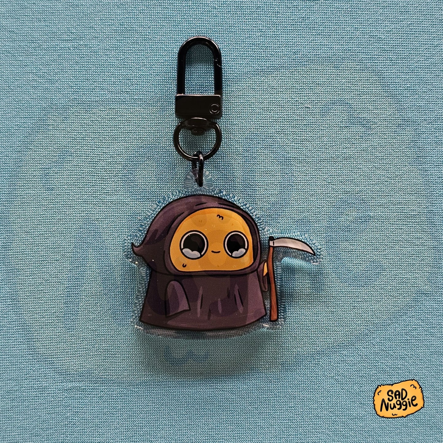 Sad Nuggie Grim Reaper Epoxy Keychain