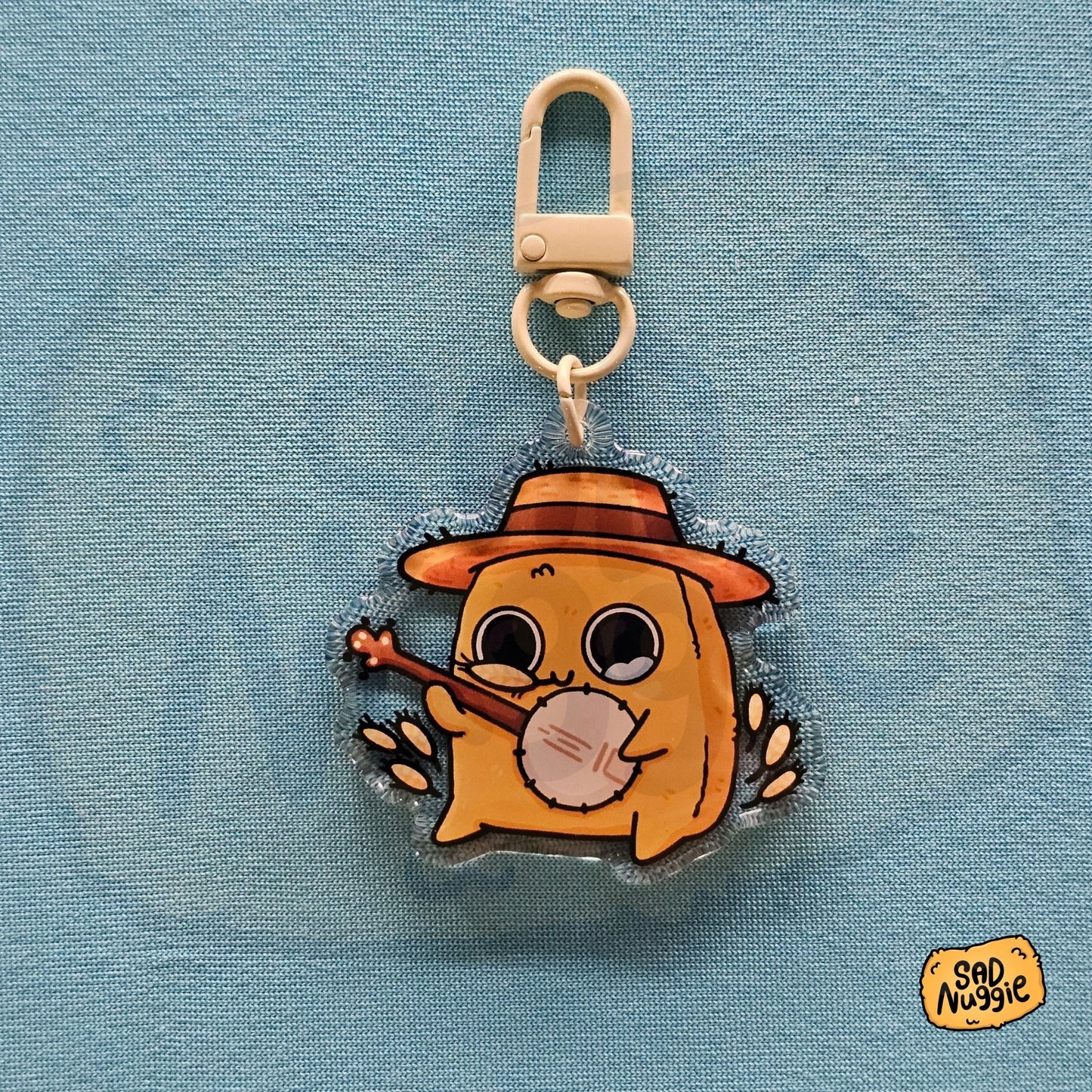 Sad Nuggie Banjo Epoxy Keychain