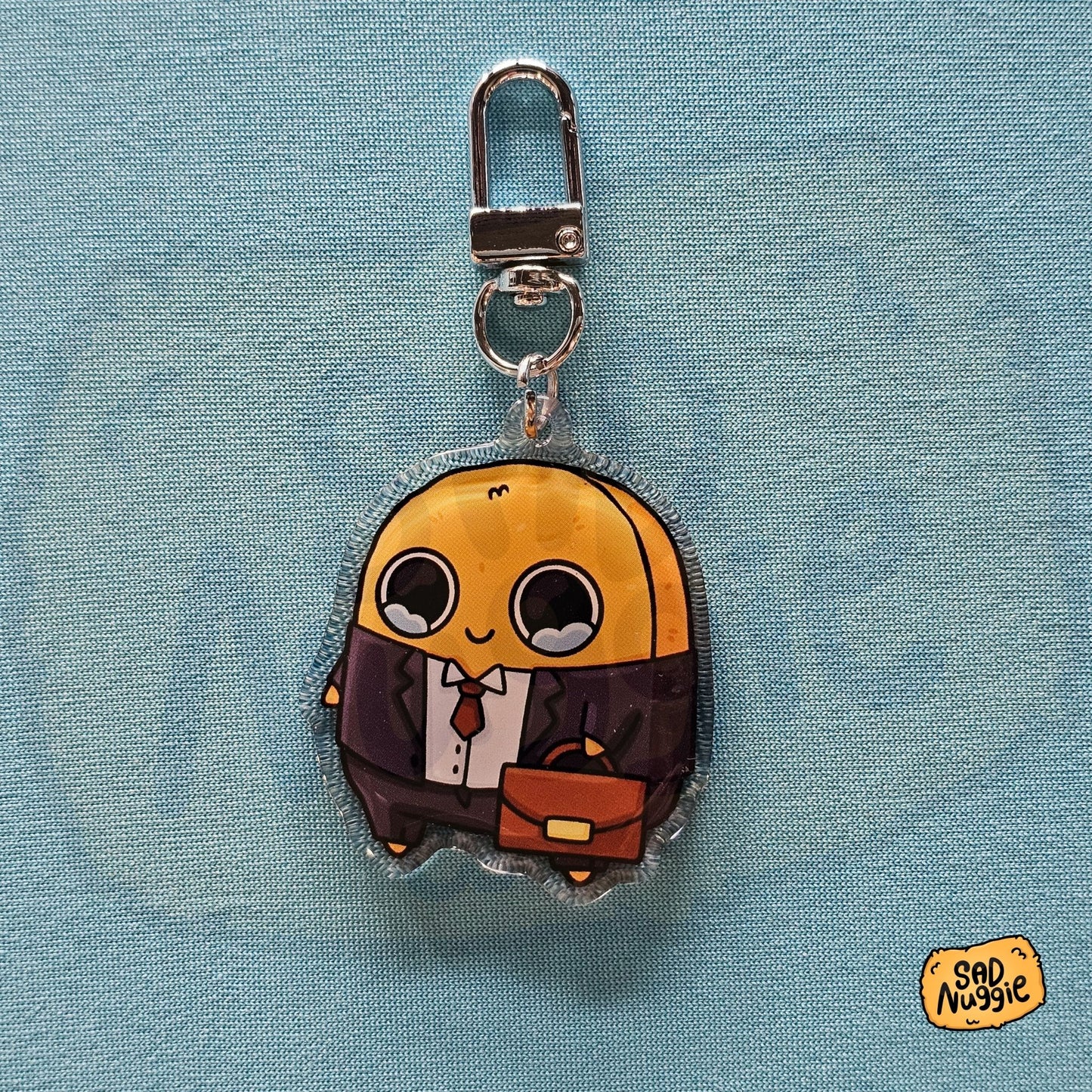 Sad Nuggie Business Epoxy Keychain